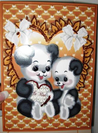 Cute Love Pandas on a Gold Frilled Heart A4 by Margarette Blakeborough