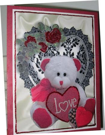 Cuddly Love Teddy Bear on Lace Heart A4 by Margarette Blakeborough