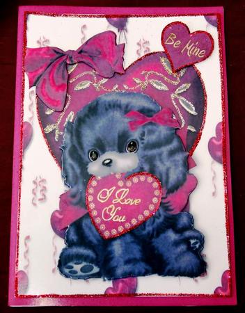 I Love You, Cute Black Puppy on a Heart by Margarette Blakeborough