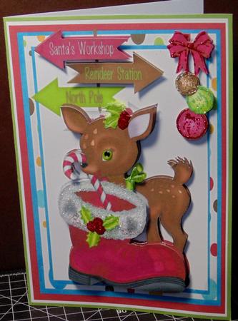 Cute Reindeerand Santa's Boots  by Margarette Blakeborough