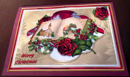 Christmas Book and Roses Card Front by Margarette Blakeborough