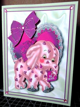 Pink Elephant on Frill Heart with Bow by Margarette Blakeborough