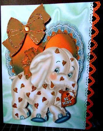 Orange Ele on Frilly Heart and Bow A4 by Margarette Blakeborough