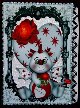 Cute Valentine Dragon with Roses in Black Lace Frame by Margarette Blakeborough