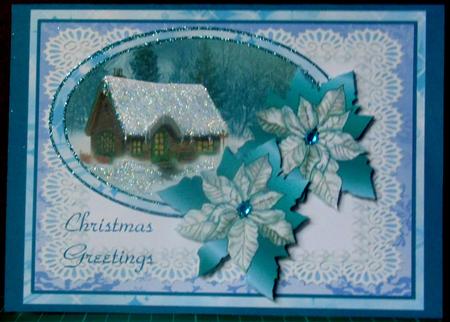 Christmas Cottage with Poinsettia by Margarette Blakeborough