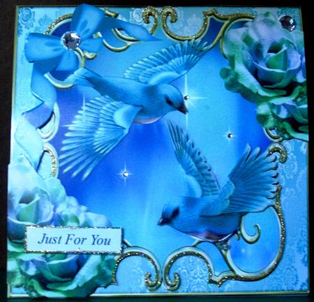 Blue Birds, with Rainbow Roses, Diamonds and Bow 8x8 by Margarette Blakeborough