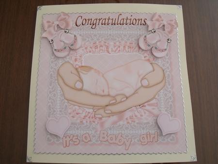 8x8 Baby Girl Cradled in Mothers Arms Featured Gallery Photo
