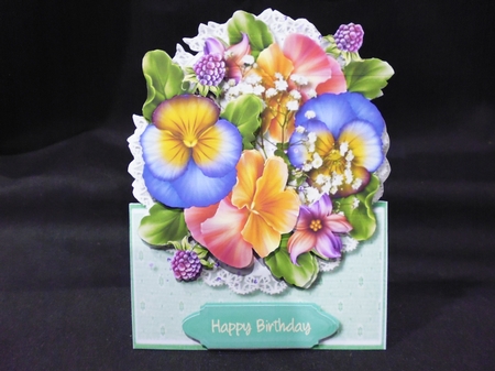 Over the Edge Beautiful Pansy's by Maria Stevens
