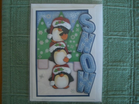 Balancing Penguins Christmas Over the Side by Marianne Kowalchuk