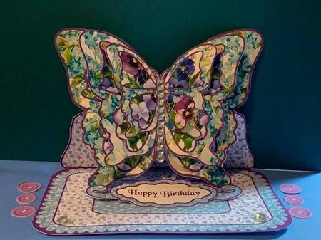 Butterfly easel Pansies and forget-me-nots by Marianne Kowalchuk