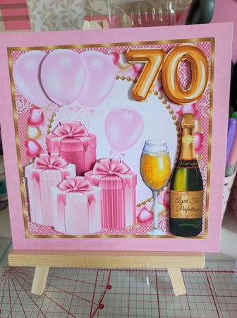 Pink age 70 balloons and presents card front by marie nowell