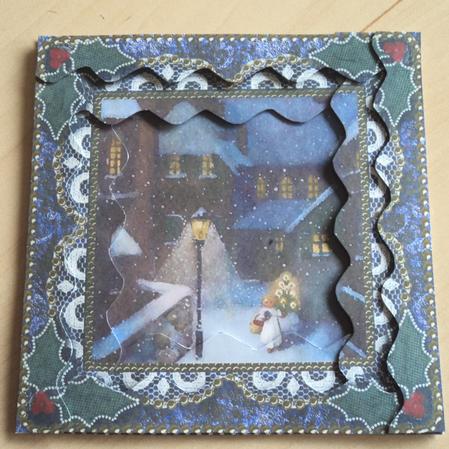Christmas Village Angel Spiral Wavy Edge Stacker Card Front by Marijke Kok