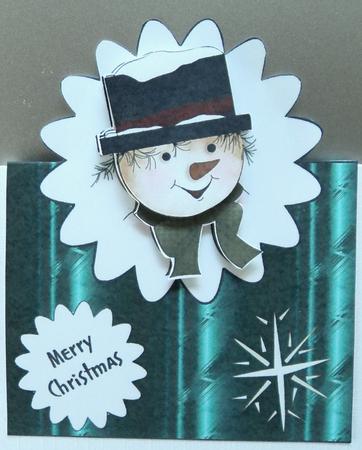 Over the Edge Snowman in Hat by Marijke Kok