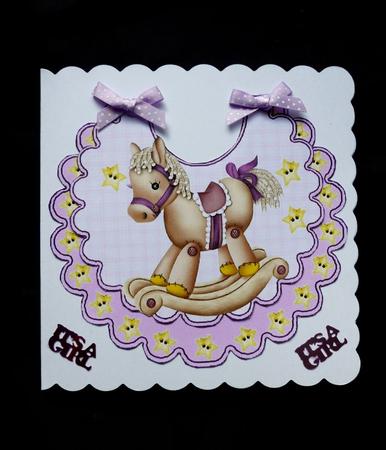 Lovely Rocking Horse with Stars on a Pink Bib by Maz Kfk