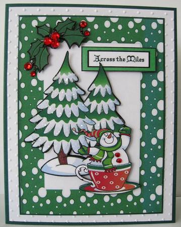 Across the Miles, Snowman in a Teacup with Tree by Marion Evans