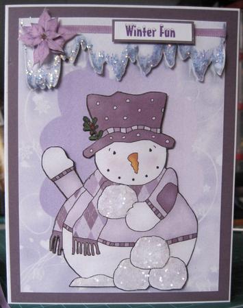 Lovely Snowman in Purple Hat by Marion Evans