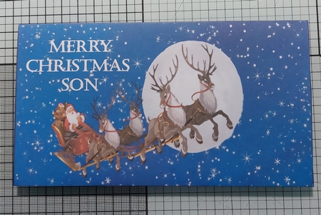 Santa on his sleigh money wallet (Son). by Marion Harding