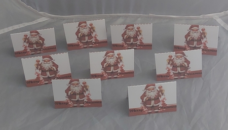 9 Santa tags by Marion Harding