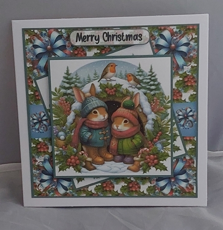 Rabbits at Christmas by Marion Harding