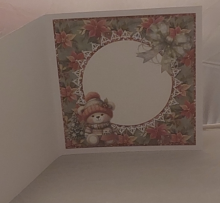 2024 Christmas Scenes 7:  Teddy Bear & Bow 8 x 8 Card Insert with Green/Red Poinsettias Background by Marion Harding