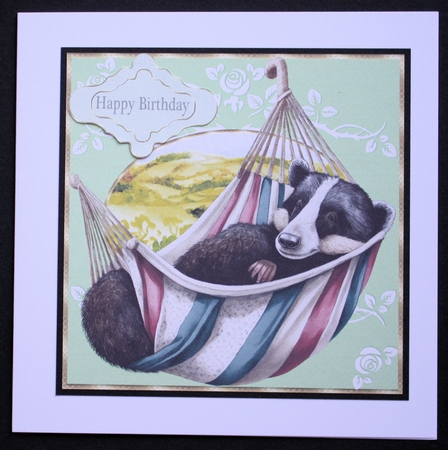 Badger on hammock card front by Marion Kimberley-Scott