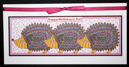 Rainbow Hedgehogs In A Row by Marion Kimberley-Scott