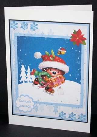 Christmas greeting card with hedgehog by Marion Kimberley-Scott