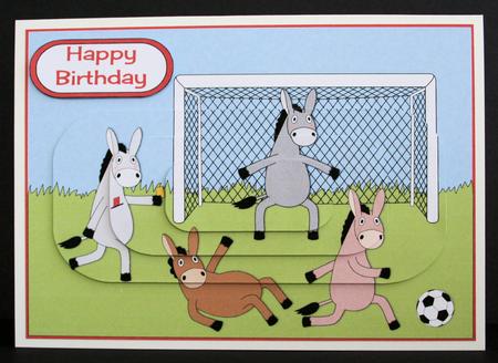 Donkeys Playing Football Pyramid by Marion Kimberley-Scott