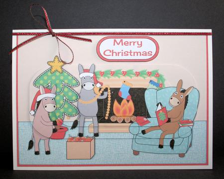 Donkeys Getting Ready for Christmas Pyramid by Marion Kimberley-Scott