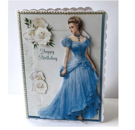 A5 Lady In Blue With White Flowers by Marion MacKellar
