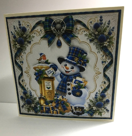 blue and gold tartan snowman by Marion MacKellar