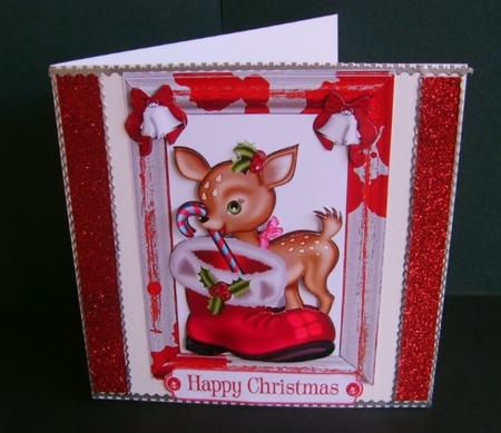 Reindeer with Santa Boot & Candycane by Marion MacKellar