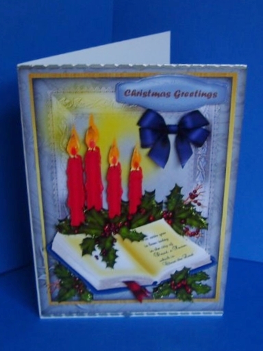 Beautiful Christmas Book and Glowing Candles by Marion MacKellar
