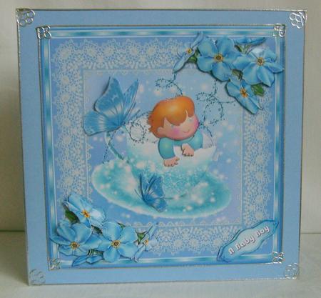 Sitting in a Teacup in Blue Large Card Front by Marion MacKellar