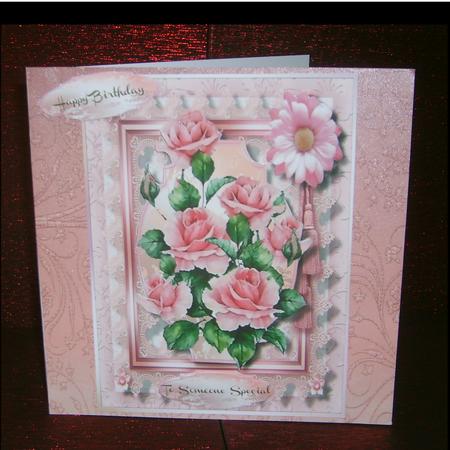 Lovely Pink Roses on Lace with a Tassel by Marion MacKellar