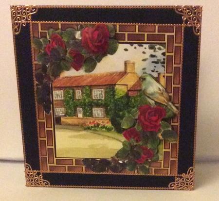 Pretty Red Roses with Cottages in Brick Effect Frame 8x8 by Marion MacKellar