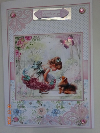 Summer day girl with Pomeranian puppy Topper by Marion West
