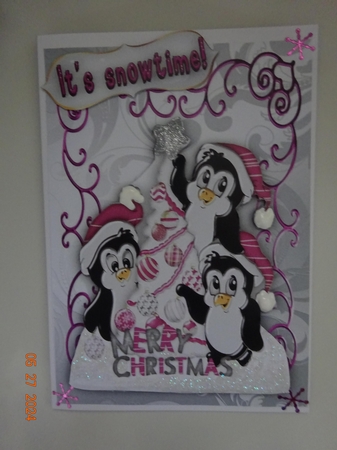 Cheeky Penguins with Pink Santa Hats On by Marion West