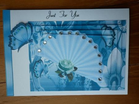 Ladies Fan on Blue Abstract Background , Pyramids by Marion West