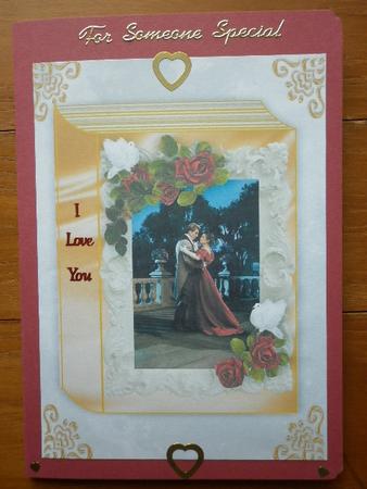 Romantic Couple on a Book of Roses A4 by Marion West