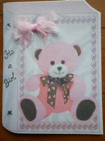 Pink Fluffy Teddy on Folded Book by Marion West