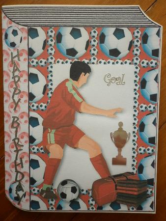 Footballer in Red, on Folded Book by Marion West