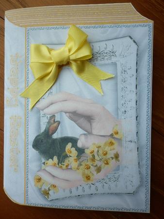 Pair of Hands with Cute Little Bunny and Flowers Folded Book by Marion West