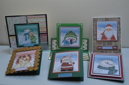 Set of 6 Christmas toppers with winter themes and choice of sentiments by Martine Smith