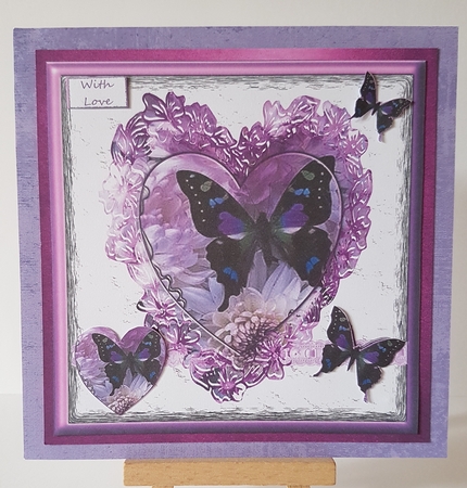 Butterfly in a Lilac Floral Lacey Frame by Mary Brunton