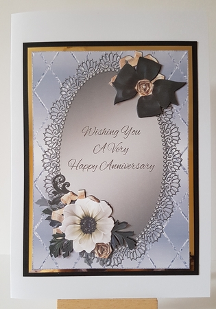 Black & White Flowers On Silver Anniversary Card Front by Mary Brunton