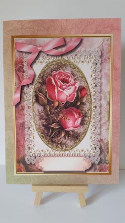 Beautiful Roses in a Ornate Oval Frame  by Mary Brunton