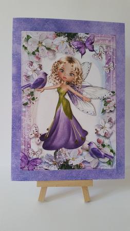 Faerie in Purple, with Flower Frame of Butterflies by Mary Brunton
