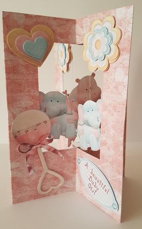 Baby Girl Star Dangle Card by Mary Brunton