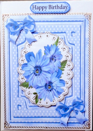 Pretty Cornflower Blue Flowers on Lace with Bows by Mary Murphy